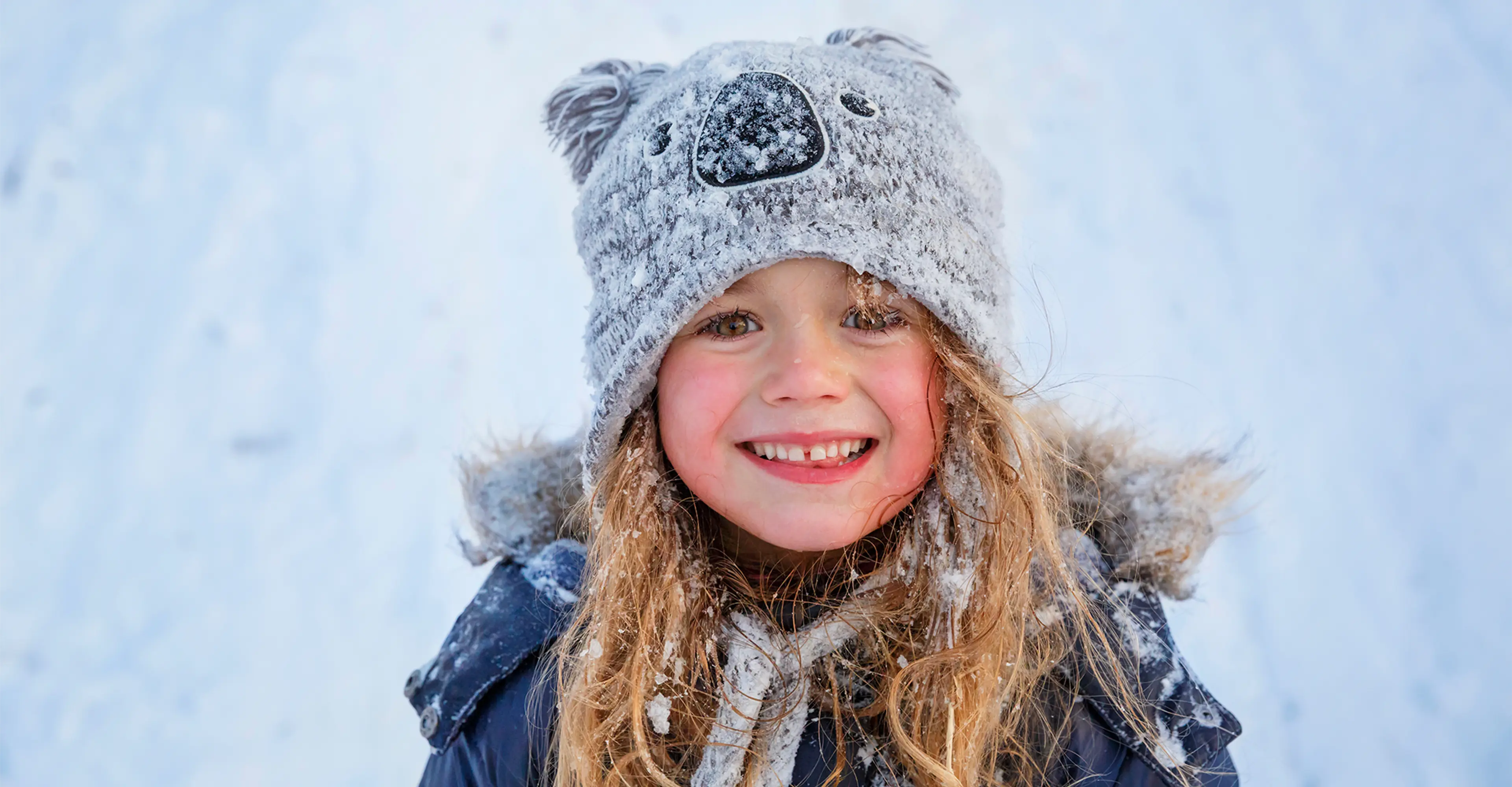 Fotografi av barn i snøen.