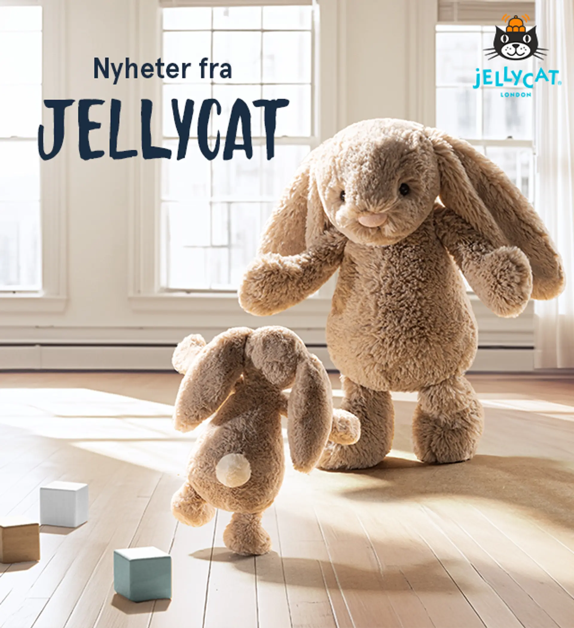 Nyheter fra Jellycat. Illustasjon av to Jellycat bashfull kaniner som skal gi hverandre en klem.