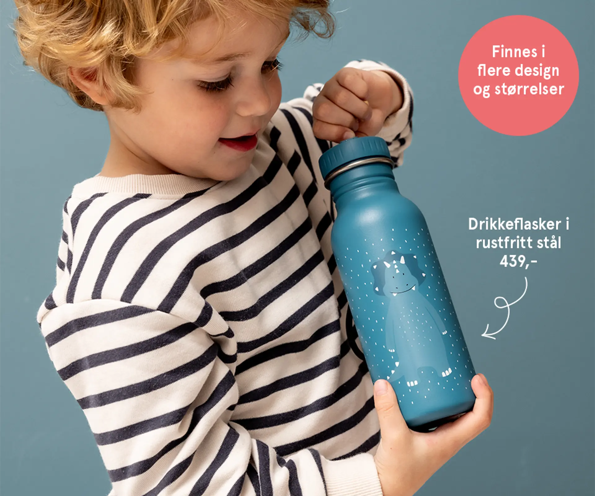 Fotografi av barn med Trixie drikkeflaske i rustfritt stål - finnes i flere design!