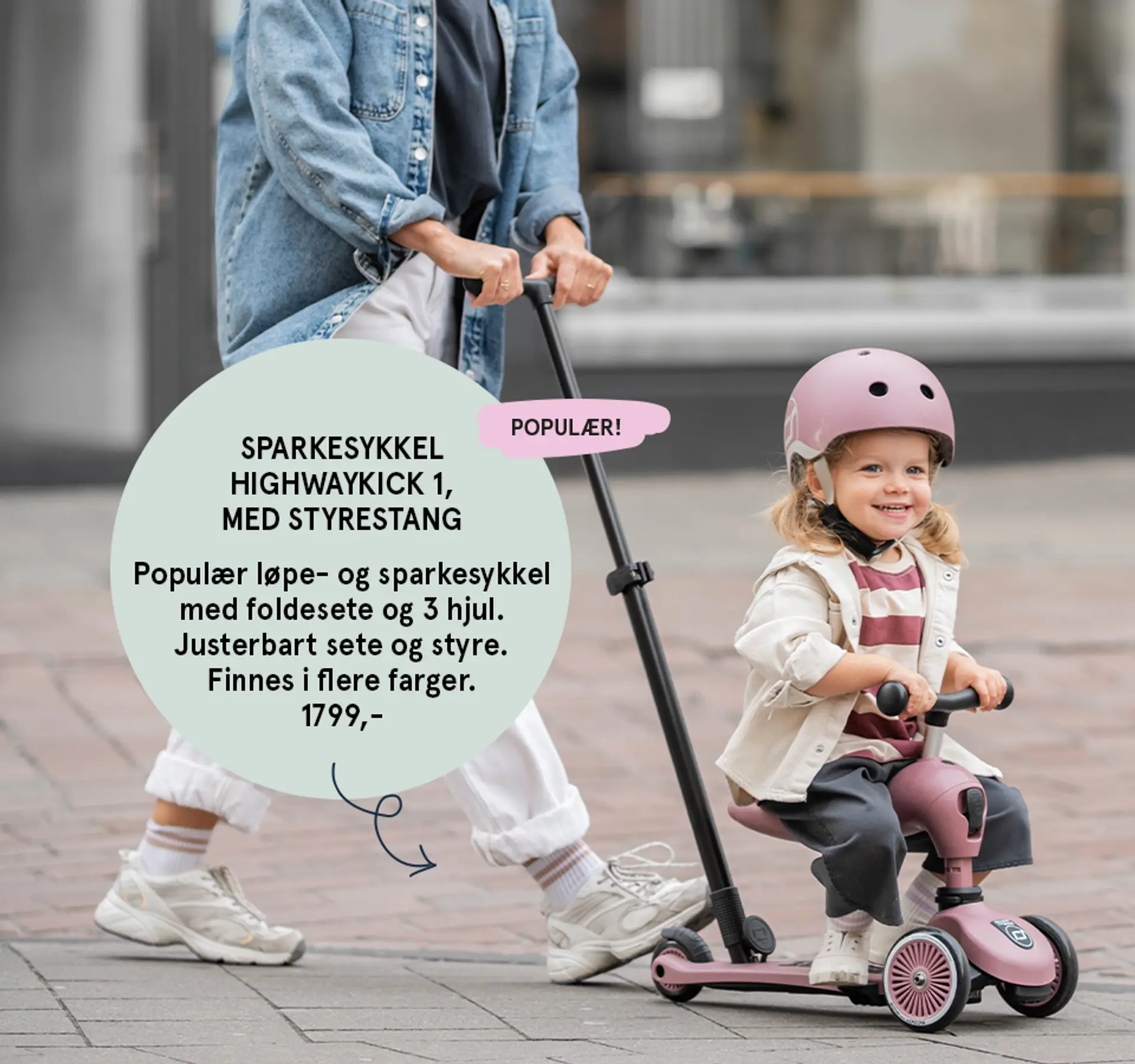 Sparkesykkel Highwaykick 1 med styrestang: Populær løpe- og sparkesykkel med foldesete og 3 hjul. Justerbart sete og styre. Finnes i flere farger - populær! Fotografi av barn sittende på løpesykkelen.