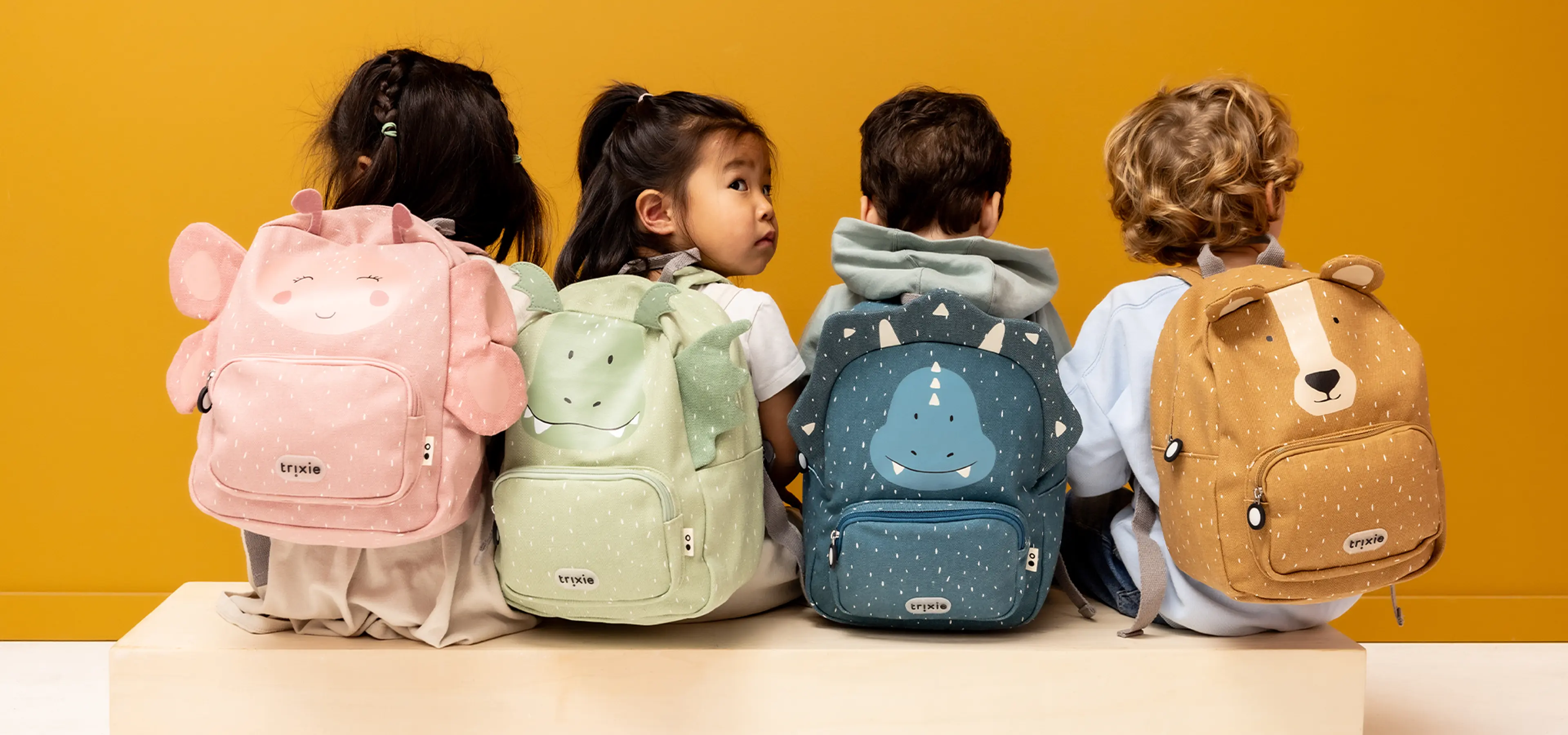 Fotografi av barn med Trixie ryggsekker.