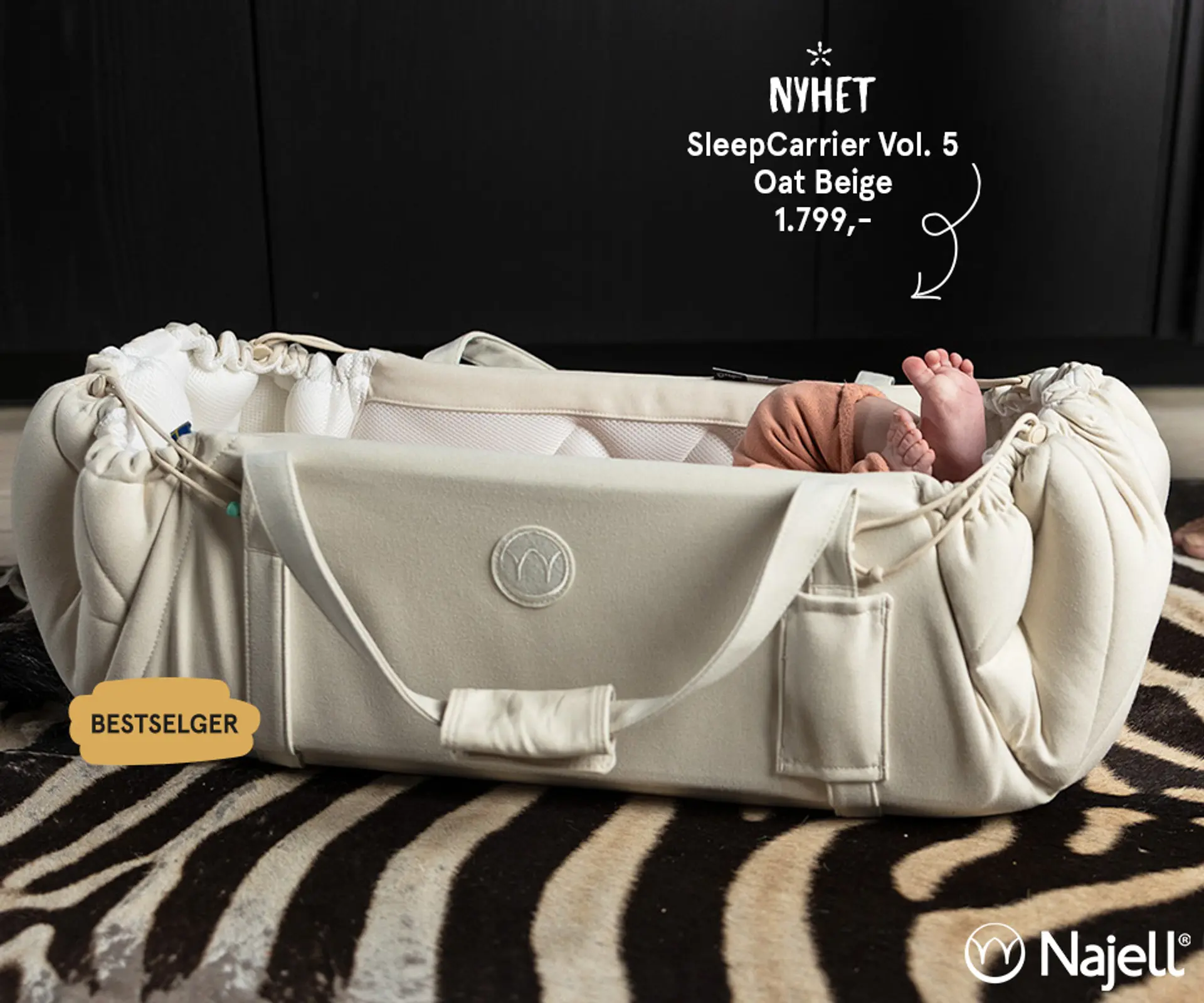 Fotografi av barn liggende i Najell SleeepCarrier X - bestselger!