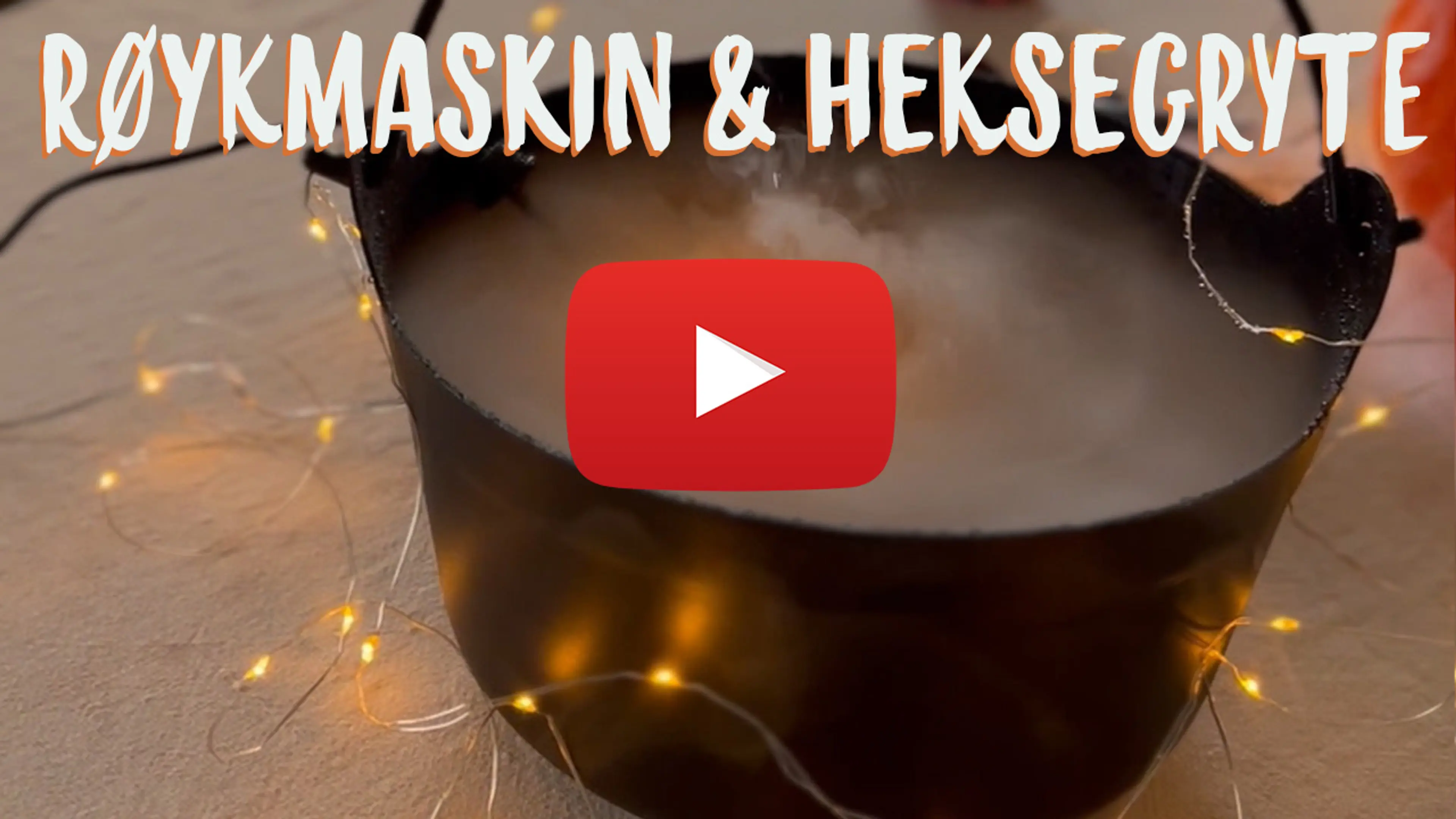 Fotografi av røykmaskin i en heksegryte.