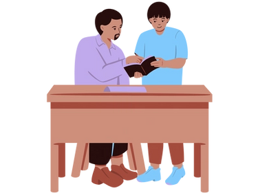 An adult and a child reading together at a desk