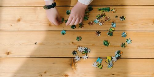 A child working on a puzzle