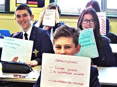 Learners at Ripley St Thomas holding up whiteboards with Tier 2 vocabulary