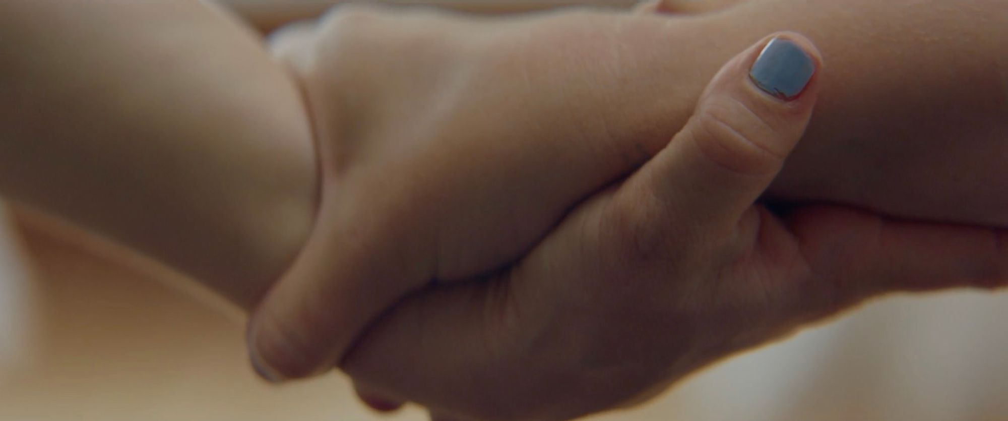 Hands, in close-up.