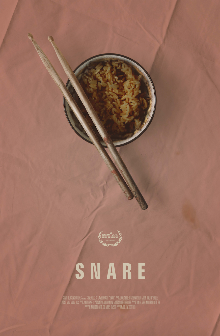 The Snare poster: a bowl of fried rice with two drumsticks laid across it like chopsticks, on a pink cloth.