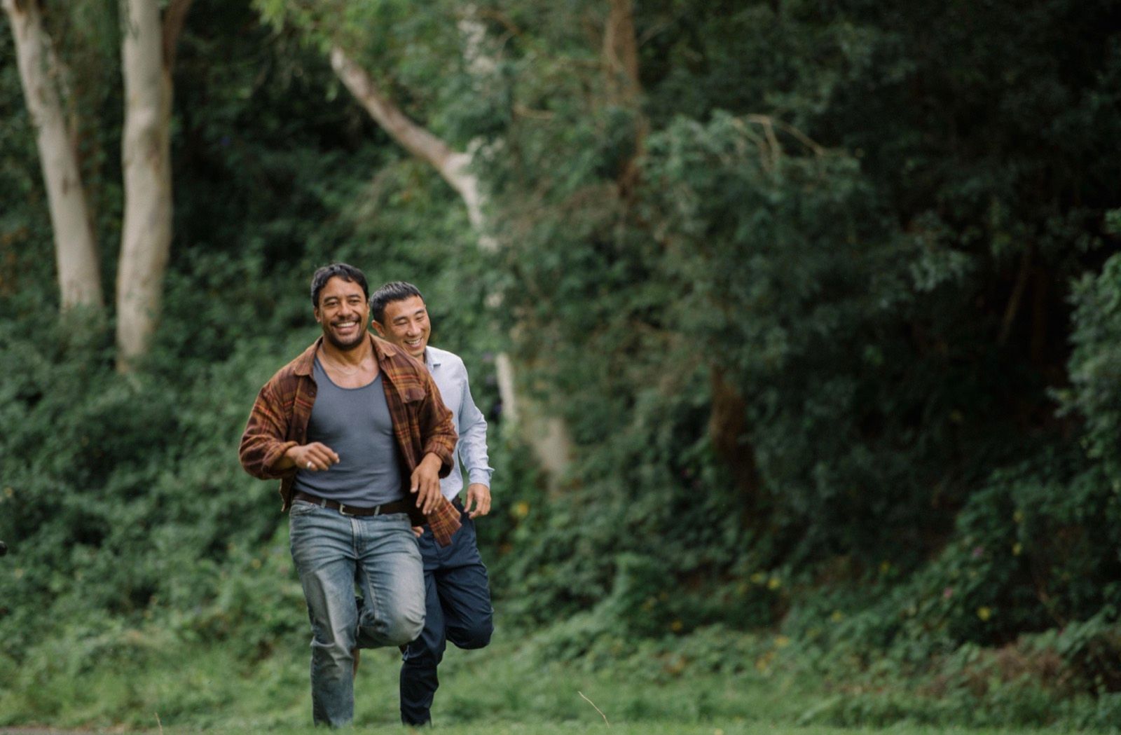 A couple walking in bushland.
