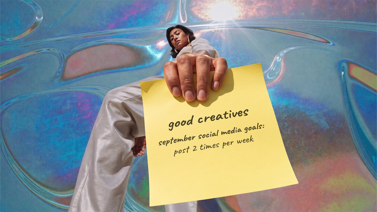 A hand holding a yellow sticky note reading "post 2 times per week."