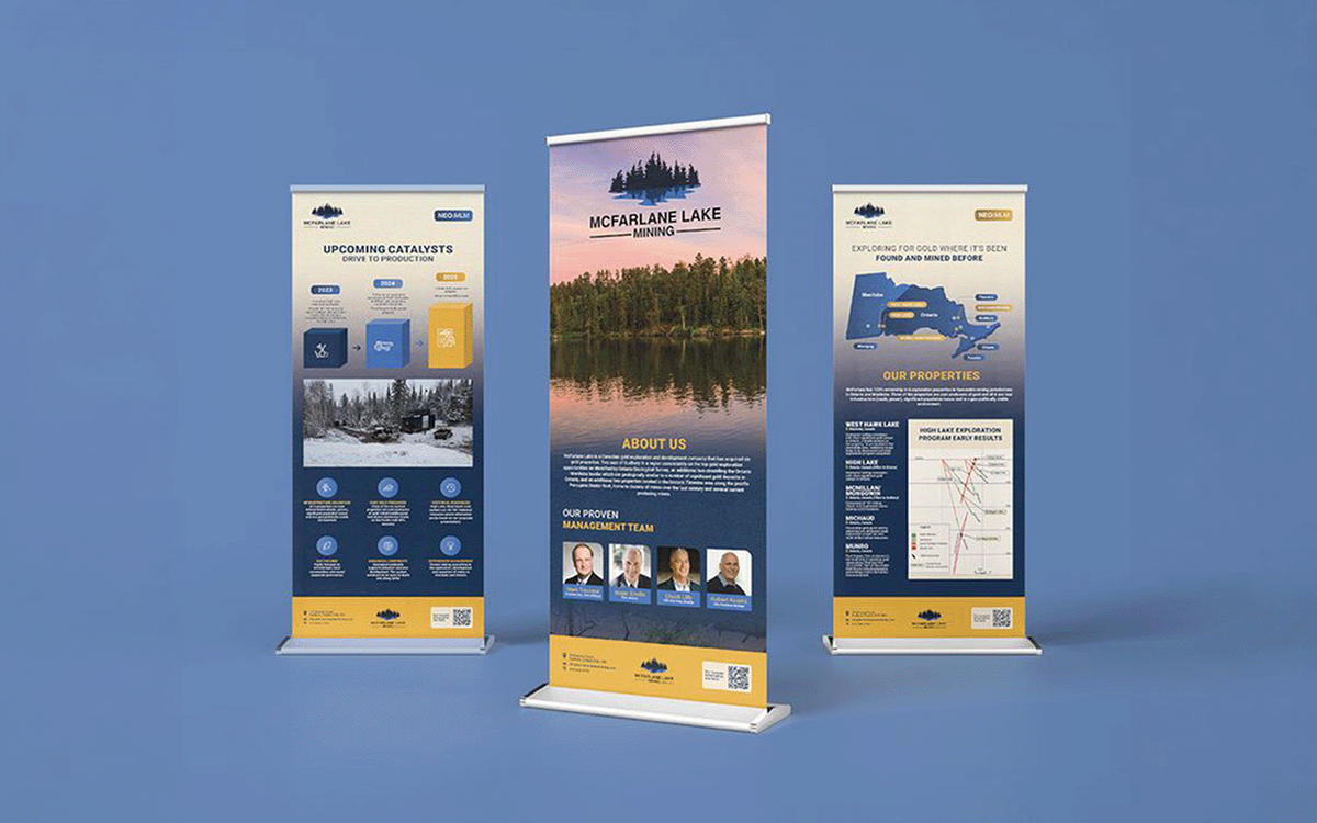 Three pull-up banner displays for McFarlane Lake Mining featuring exploration timelines, property maps, and management team photos.