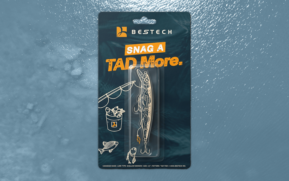A blister-pack fishing lure package for BESTECH reading "Snag a TAD More," featuring a fish-patterned lure and illustrated fishing icons on a dark teal background.