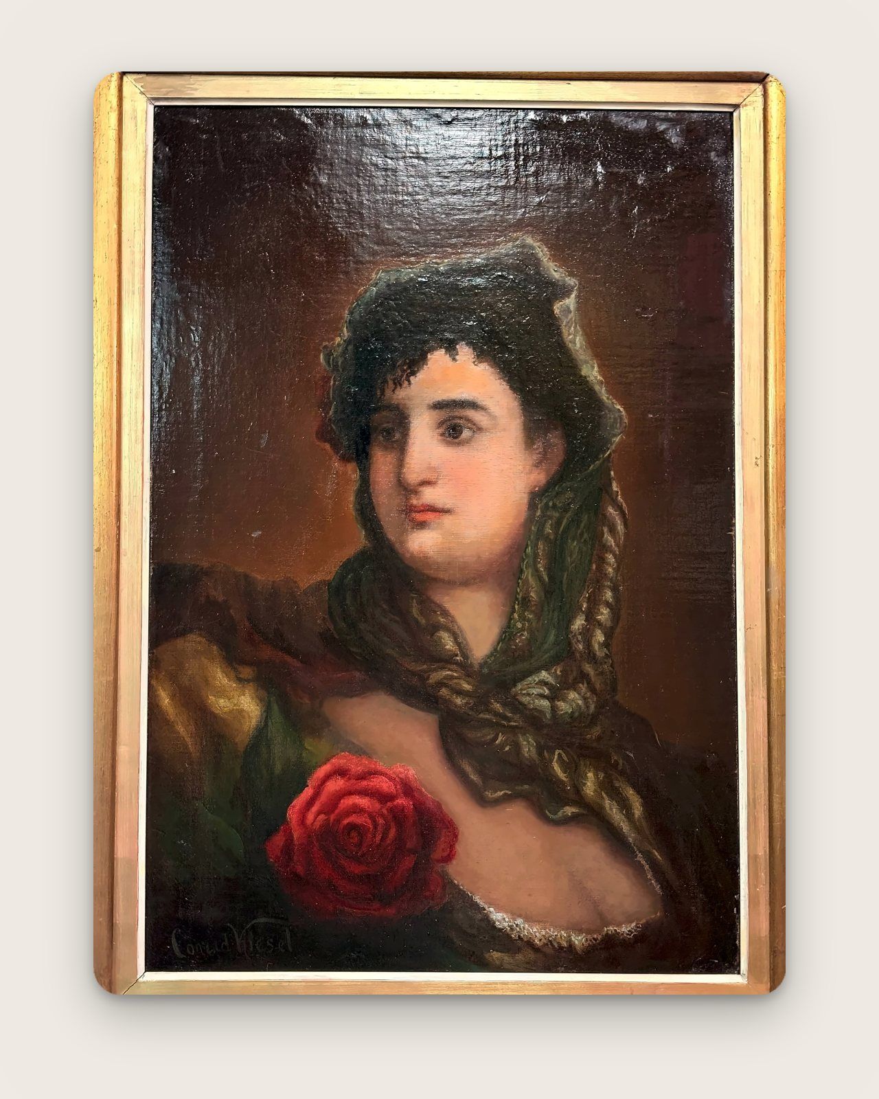 Painting: portrait of a woman with a dark veil and a red rose, in a gilded frame