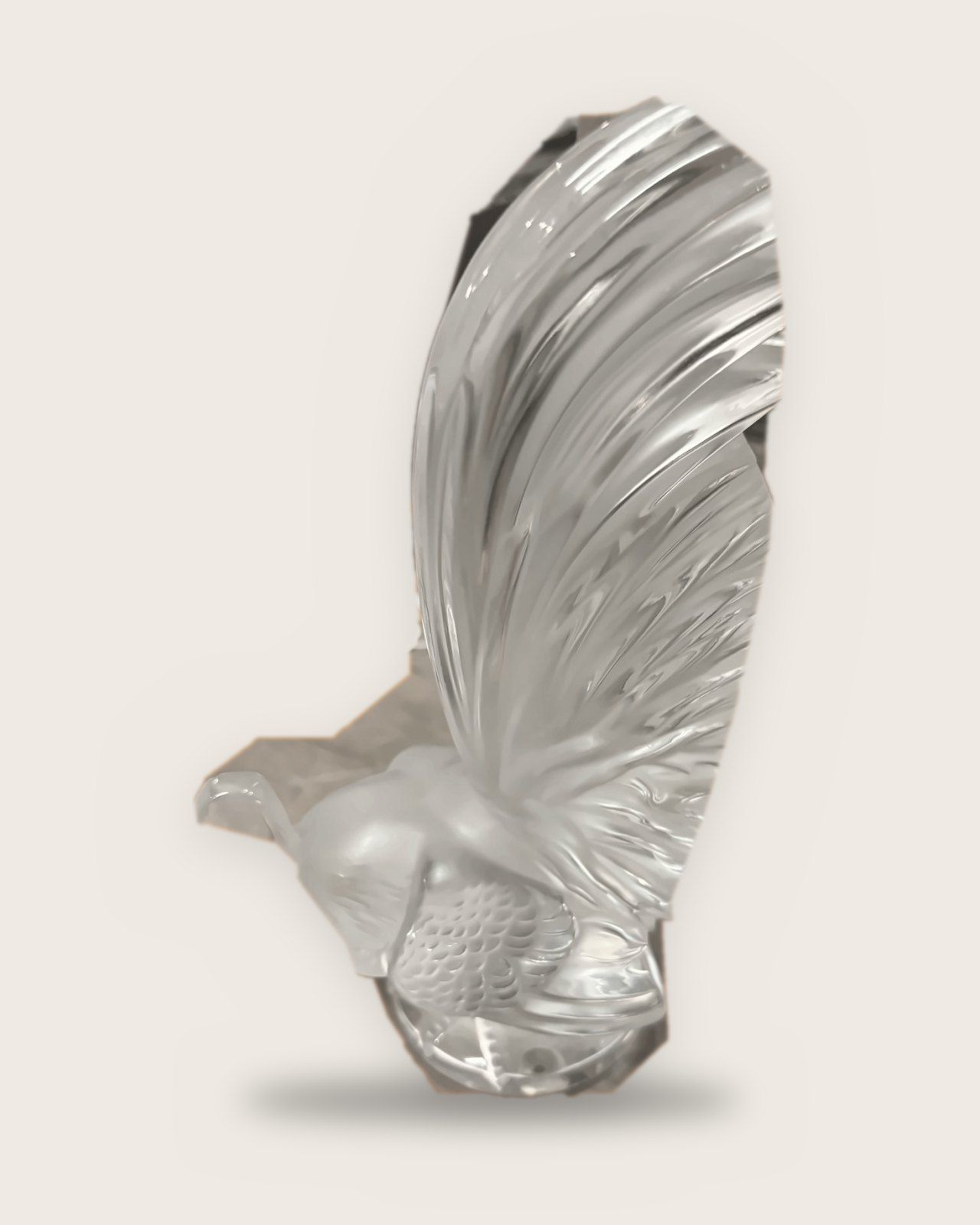 Lalique rooster figure with a tall fanned tail