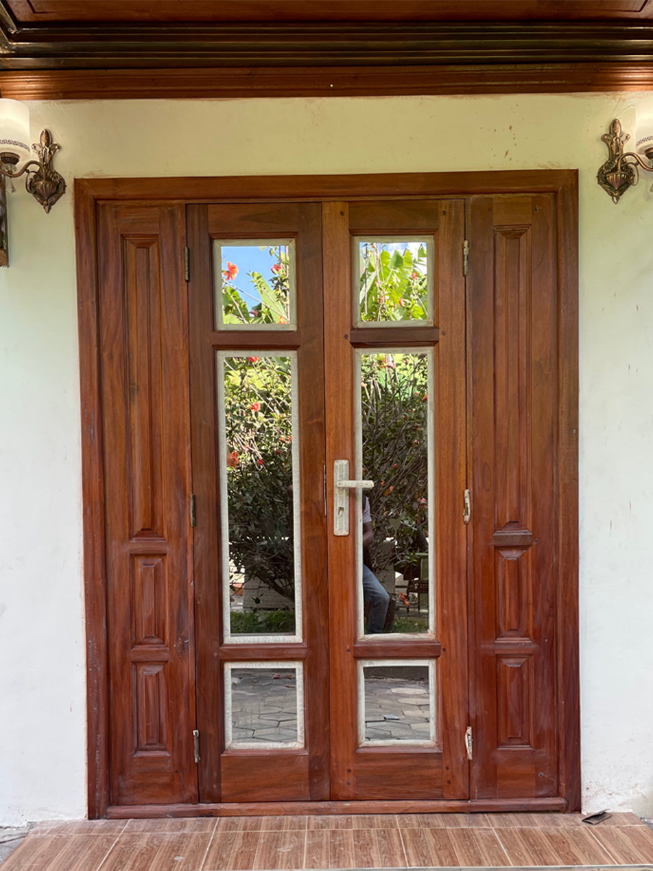 double mahogany door with french design - 1 of 2
