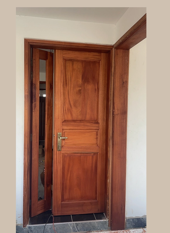Double mahogany door with fan light