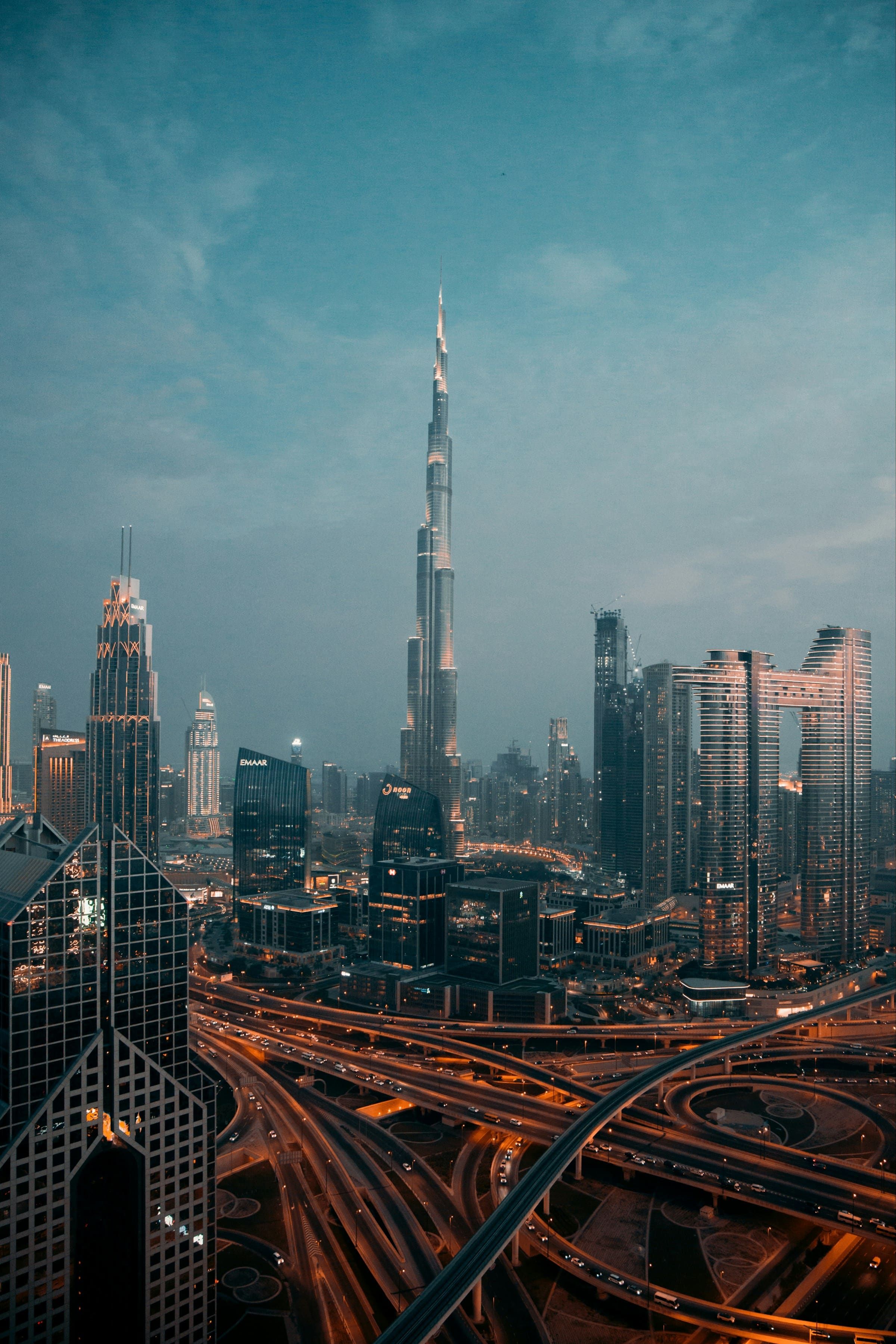 Dubai skyline and highways at dusk
