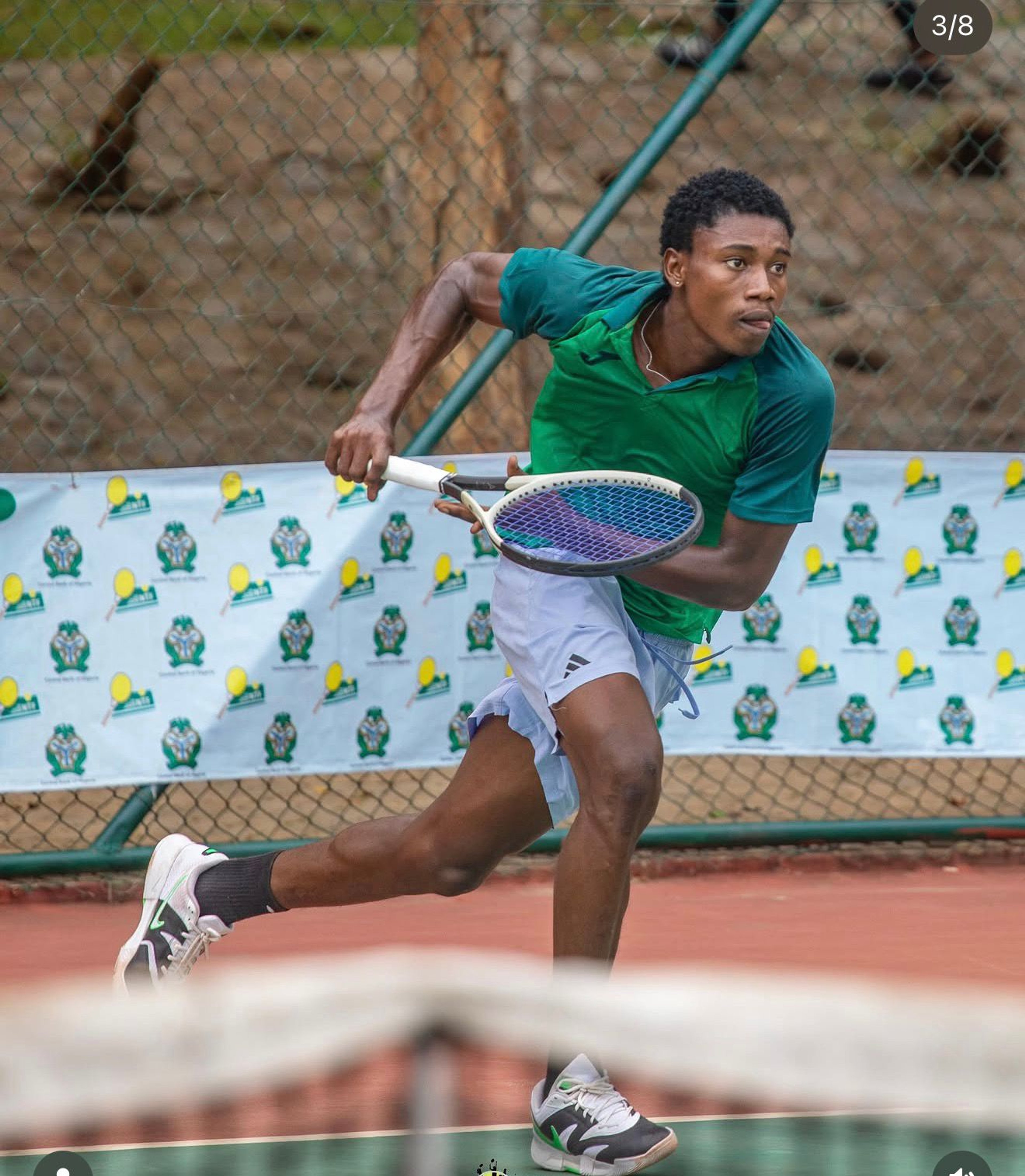 Chasing down a forehand in the men's singles final