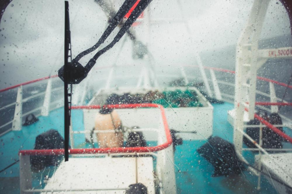 View out of the wheelhouse window in a storm