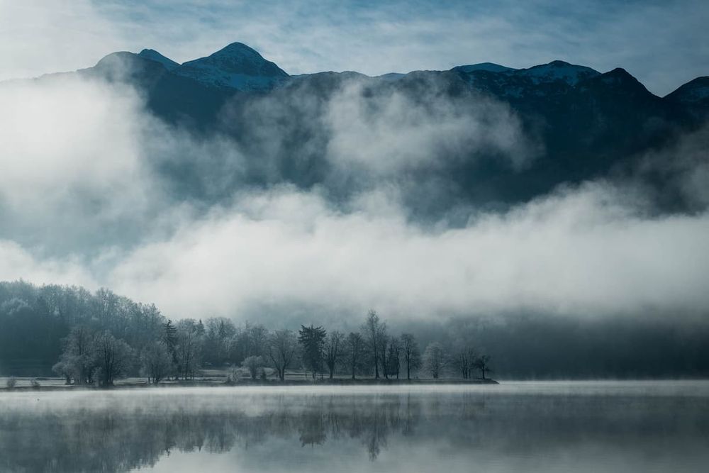 Misty lake and mountains