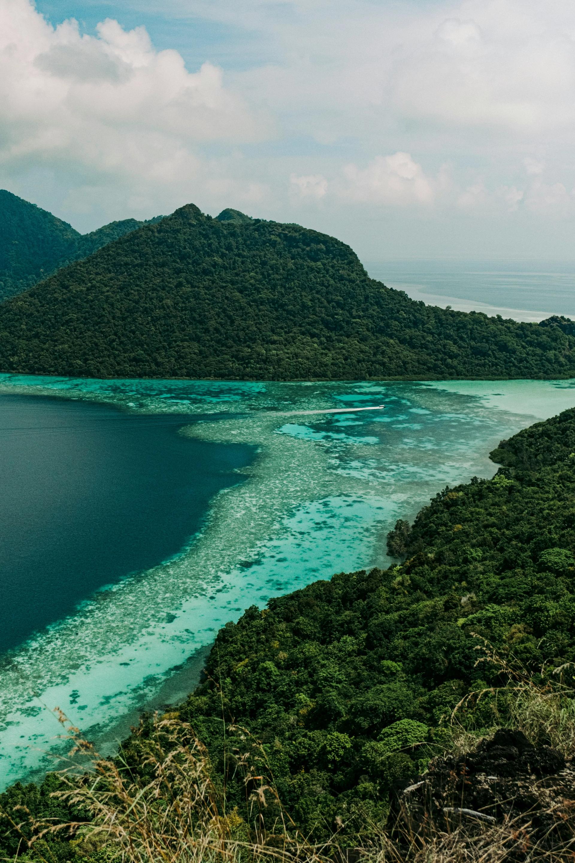 Turquoise lagoon weaving between the limestone karst islands of Raja Ampat, Indonesia