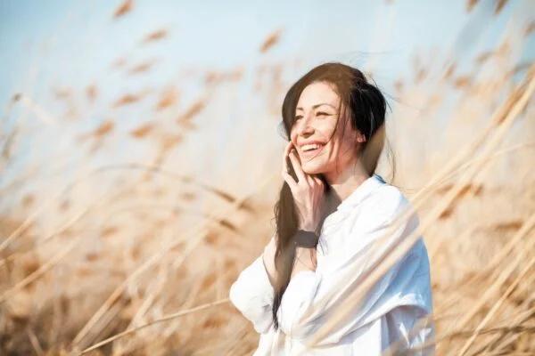 Happy Woman in Natural Field