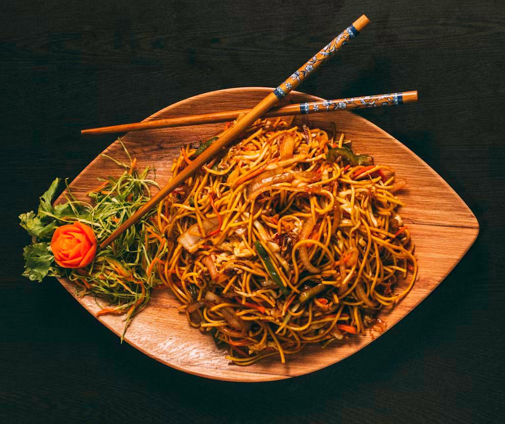 Naturopath reviewing dietary assessment notes with a patient