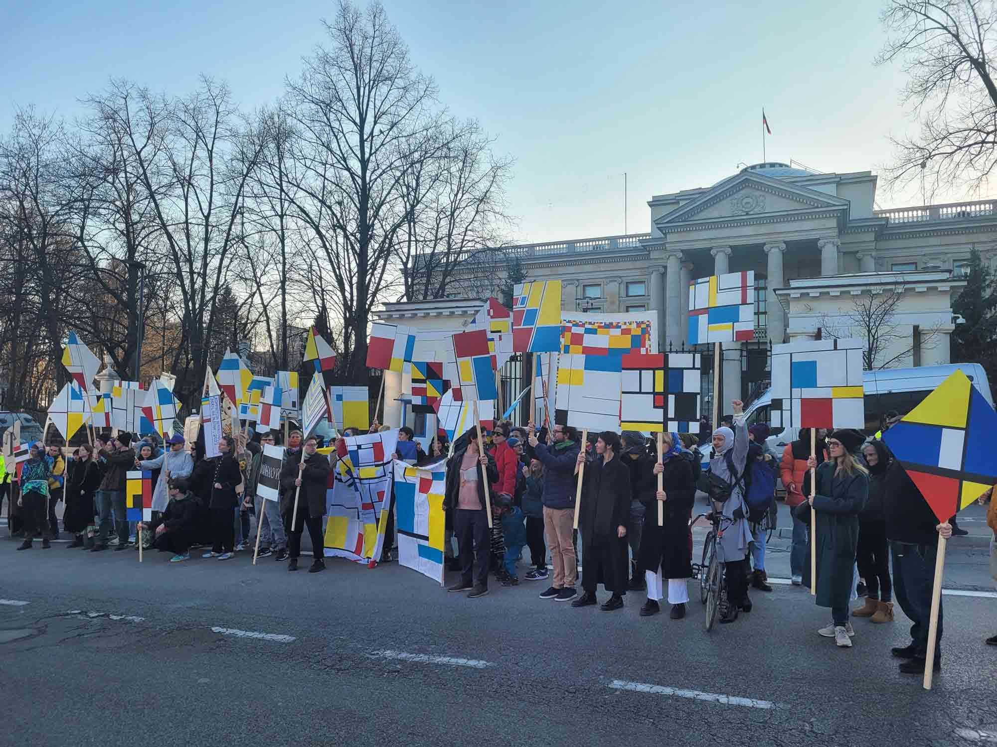 Neoplasticist demostration of paintings against Russian invasion of Ukraine in March 2022, initiated by Michał Frydrych, Yulia Krivich and other members of the Consortium for Postartistic Practices.