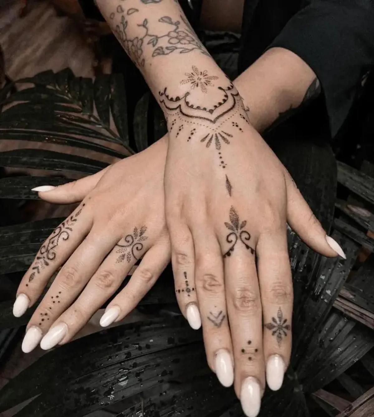 Ornamental hand tattoo