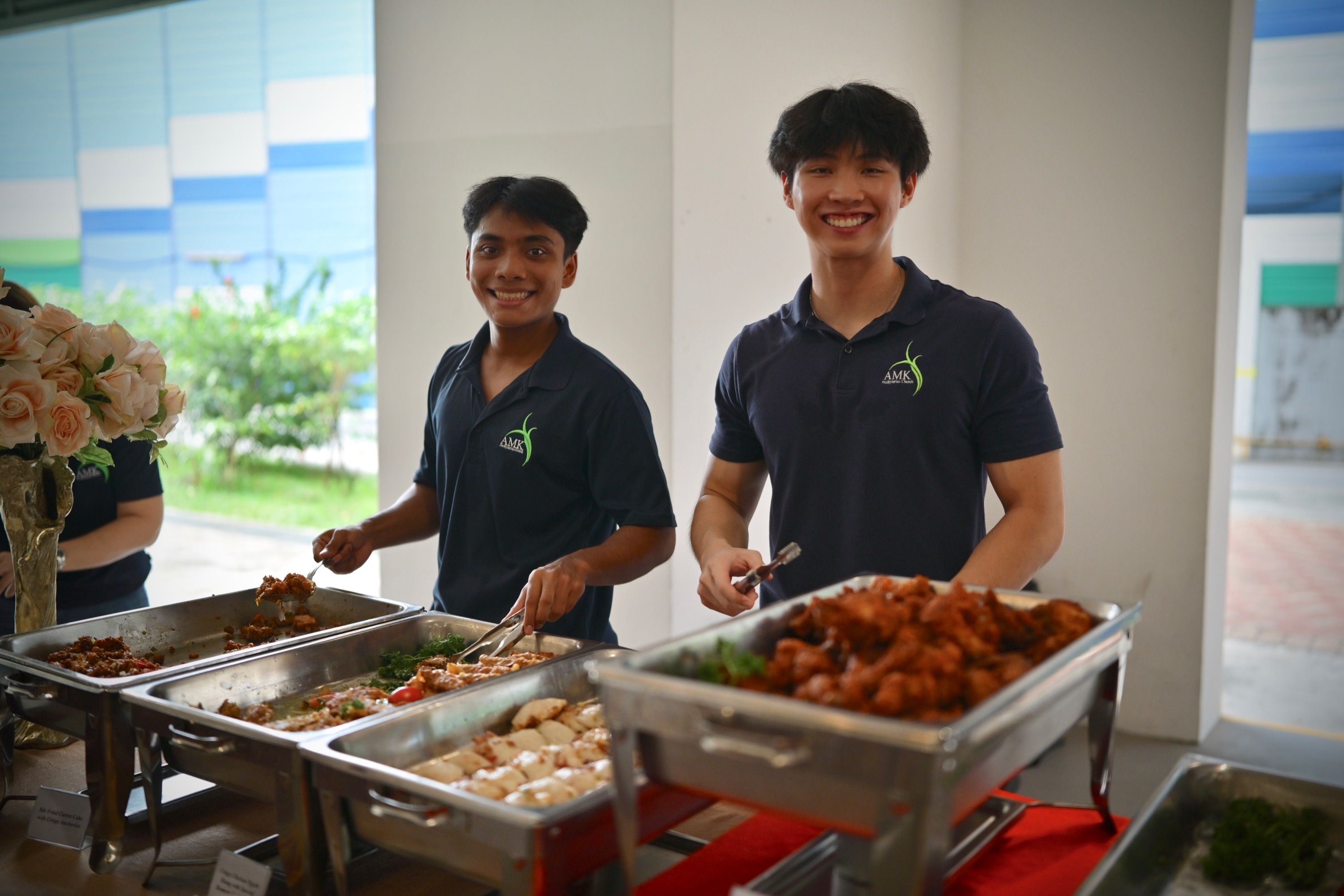 Youths on duty serving food