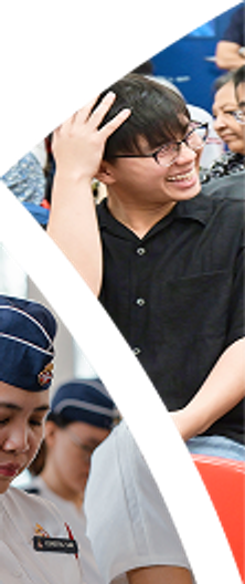 Young man waving during worship