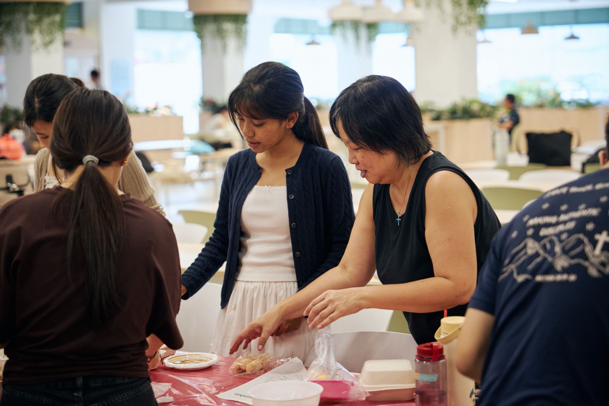 Youth and Adult preparing food
