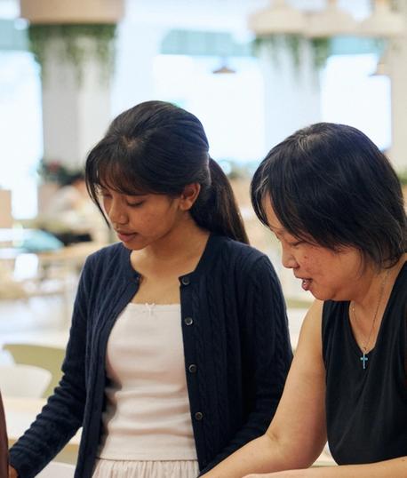 Youth and Adult preparing food