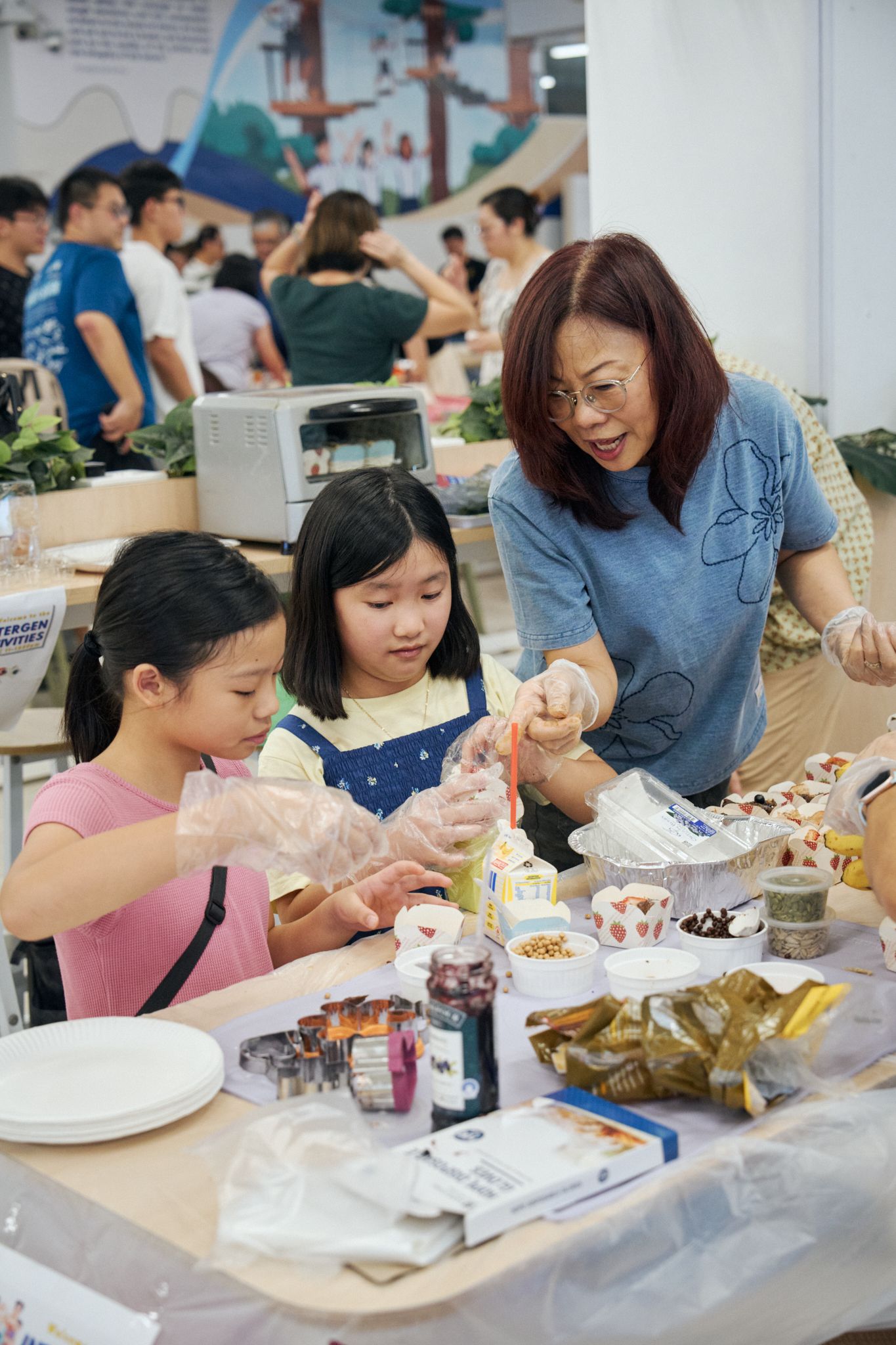 Children and adult preparing food