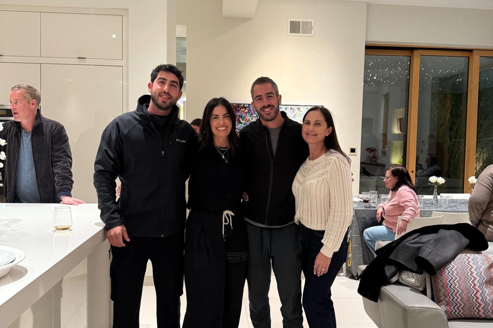 Belinda, Shai, and others at a party