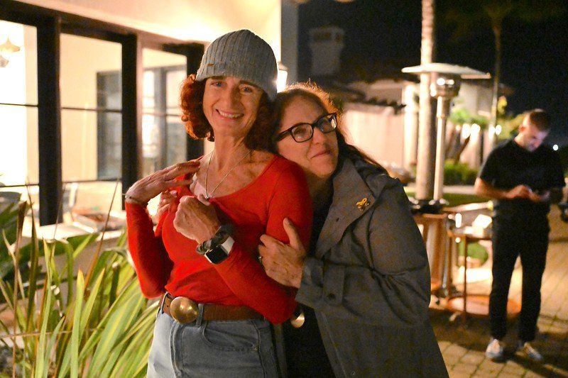 Hug between Jewmanity members outside