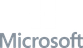 Microsoft logo: a white four-square symbol above the word "Microsoft" in grey.
