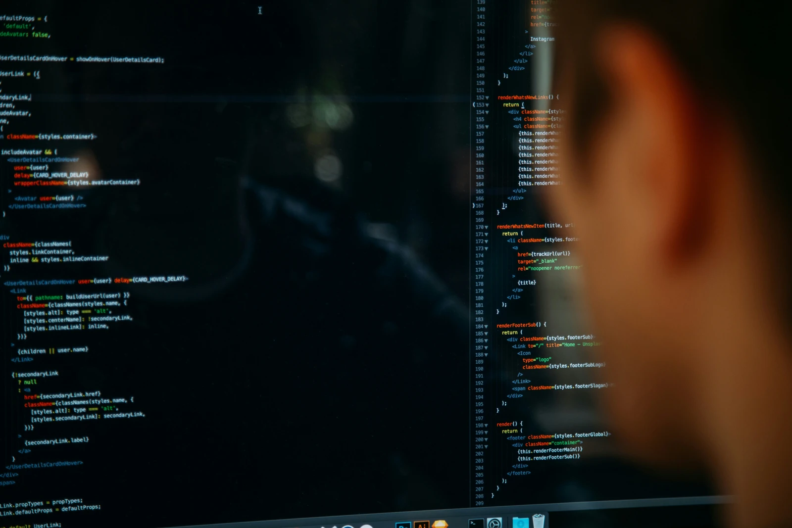 A monitor displaying Javascript code