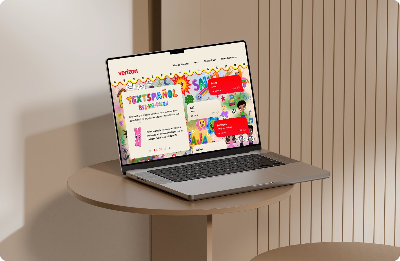 A laptop screen showing the Textspañol website homepage