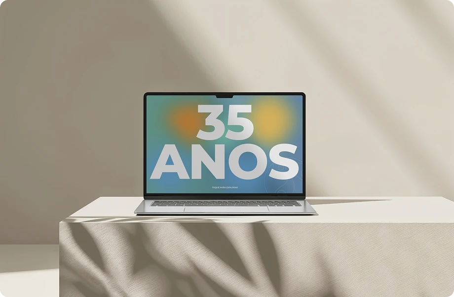 A laptop screen showing the words 35 YEARS over a colorful background