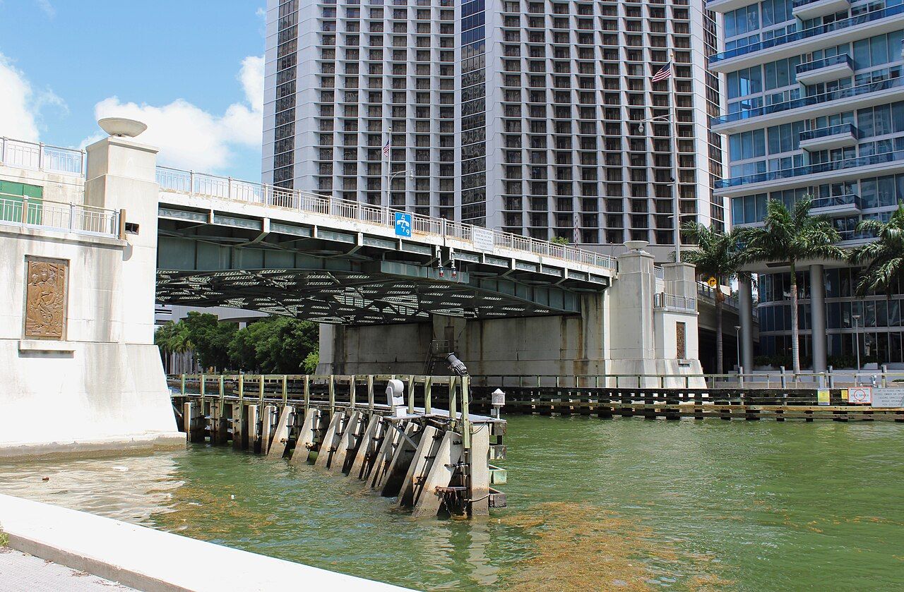 Brickell Avenue Bridge crossing the Miami River with waterfront towers, photographed from the southeast in June 2015.