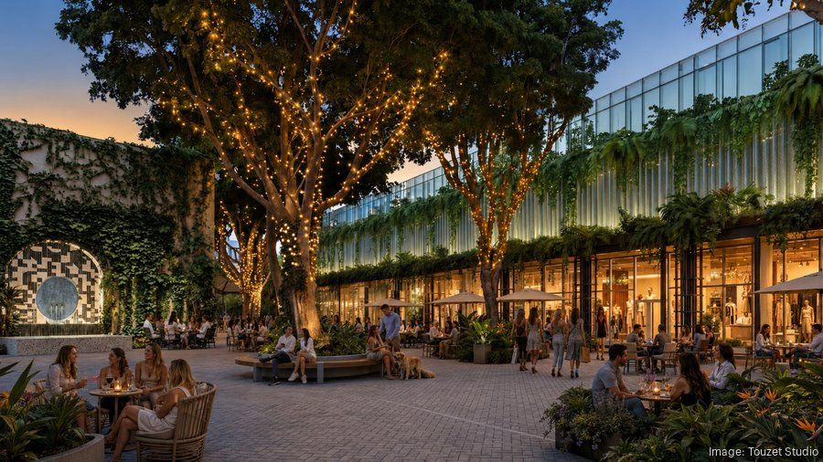 Architectural visualization of an illuminated pedestrian courtyard with new storefront frontage.