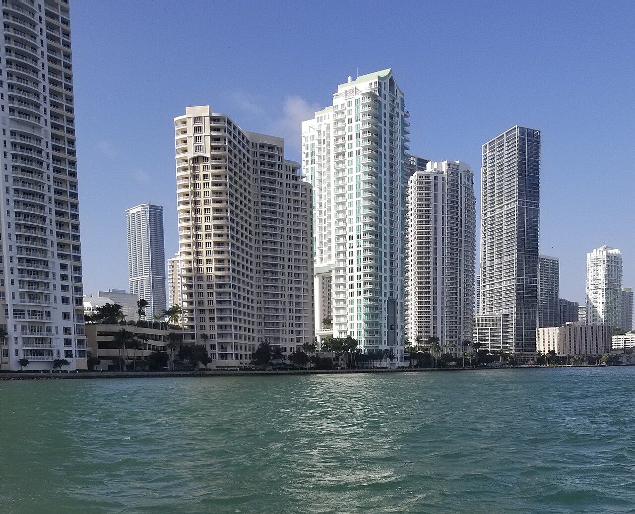 Brickell Key waterfront condominium skyline viewed from the mouth of the Miami River in February 2020.