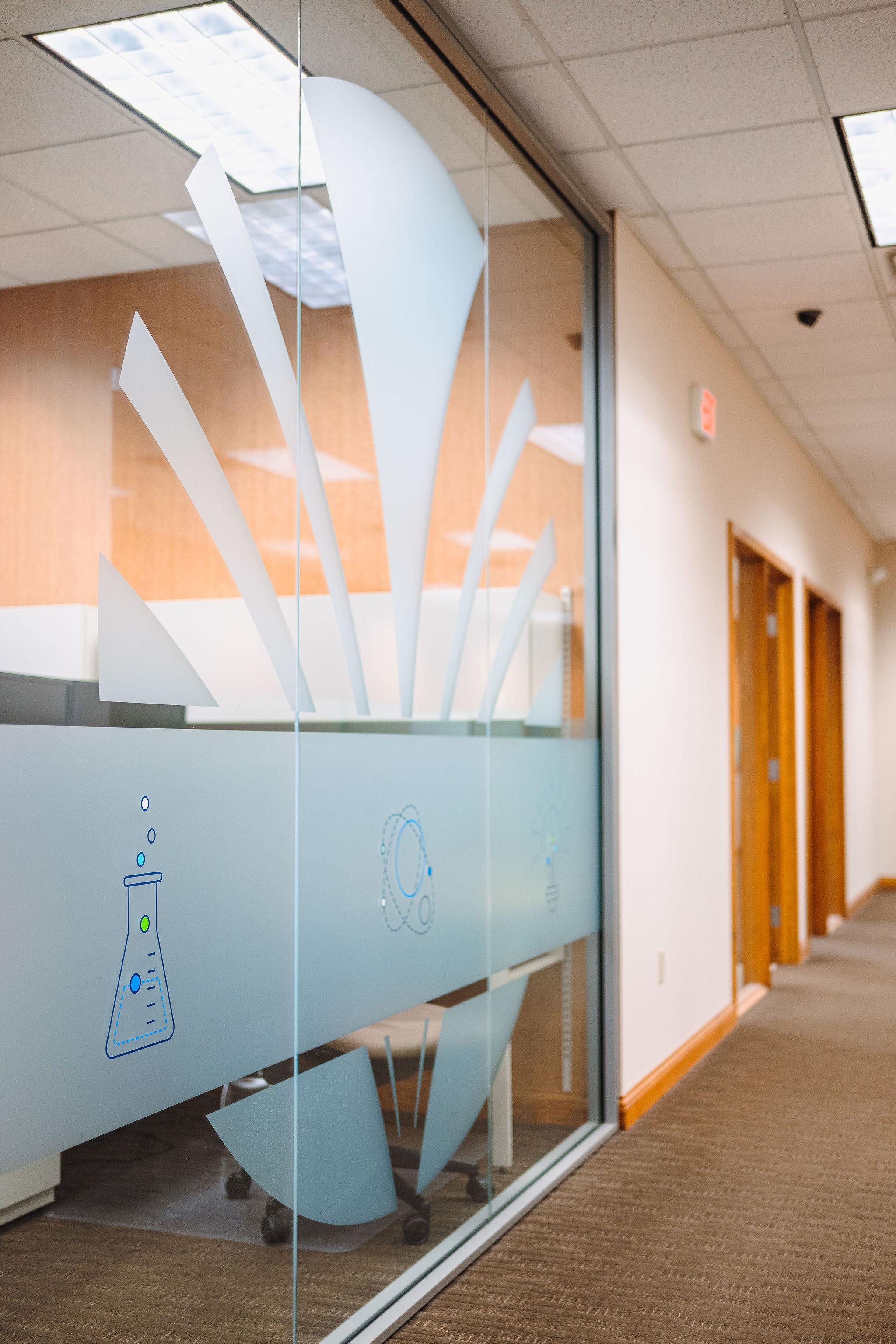 WSI office with chemistry branding on glass wall