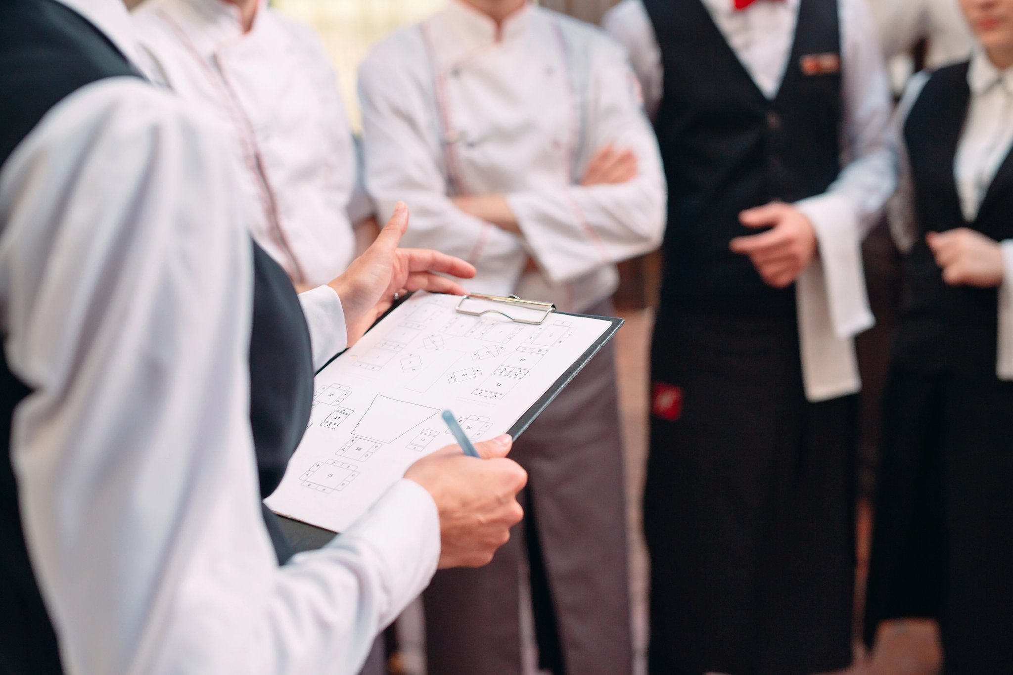 Restaurant kitchen with clean chef coats and linens