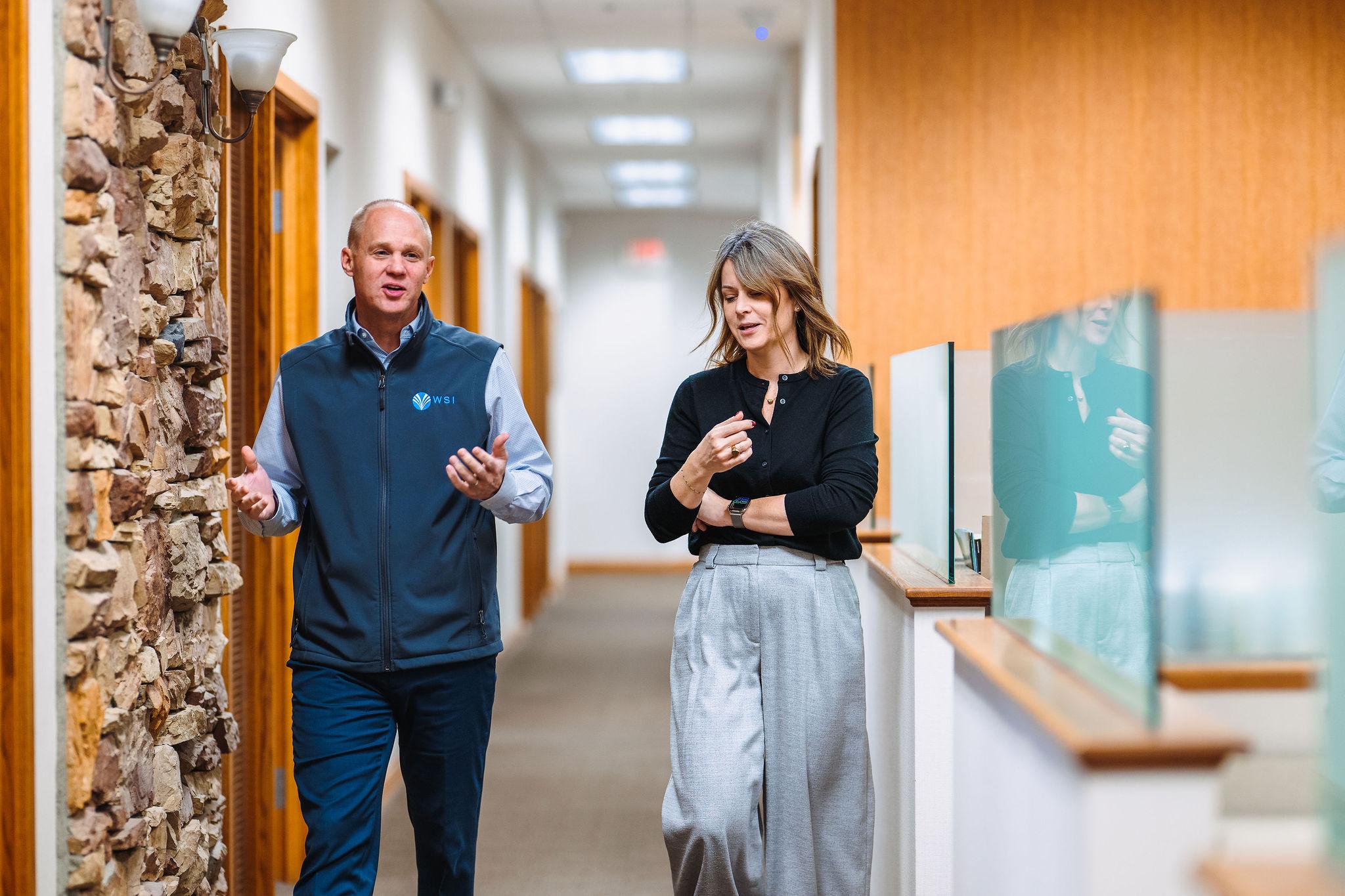 WSI leadership in office hallway
