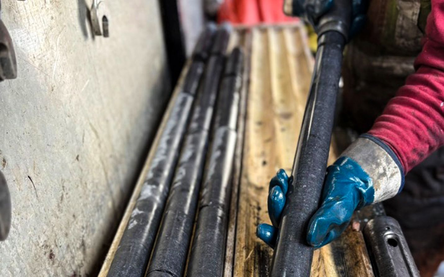 A person holding a pipe AI-generated content may be incorrect.