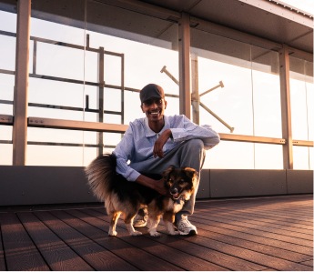 Mo chilling on roof with a dog.