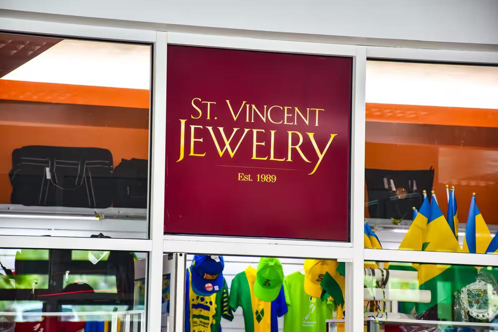 St. Vincent Jewlery Logo at business entrance with souvenirs in the shop 