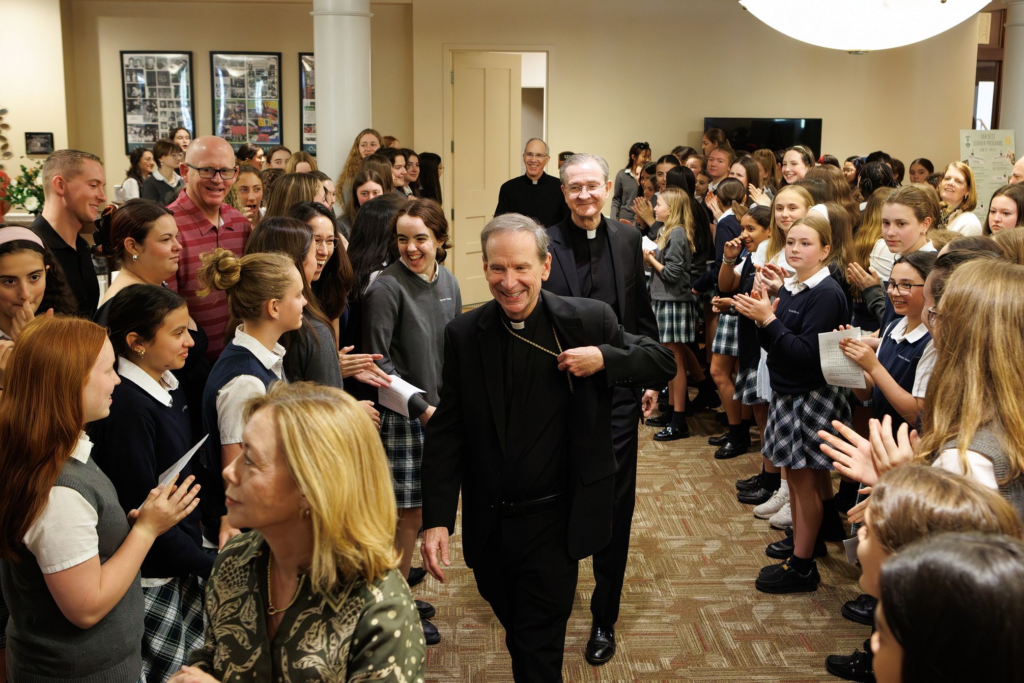 All smiles in the lobby after mass.